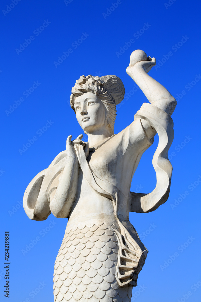 mermaid sculpture in the Beihe Park on december 26, 2013, Luannan County, Hebei Province, China. mermaid sculpture in the Beihe Park on december 26, 2013, Luannan County, Hebei Province, China.