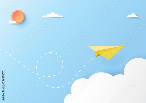 Yellow paper airplane flying on clouds and blue sky paper art style.Vector illustration.