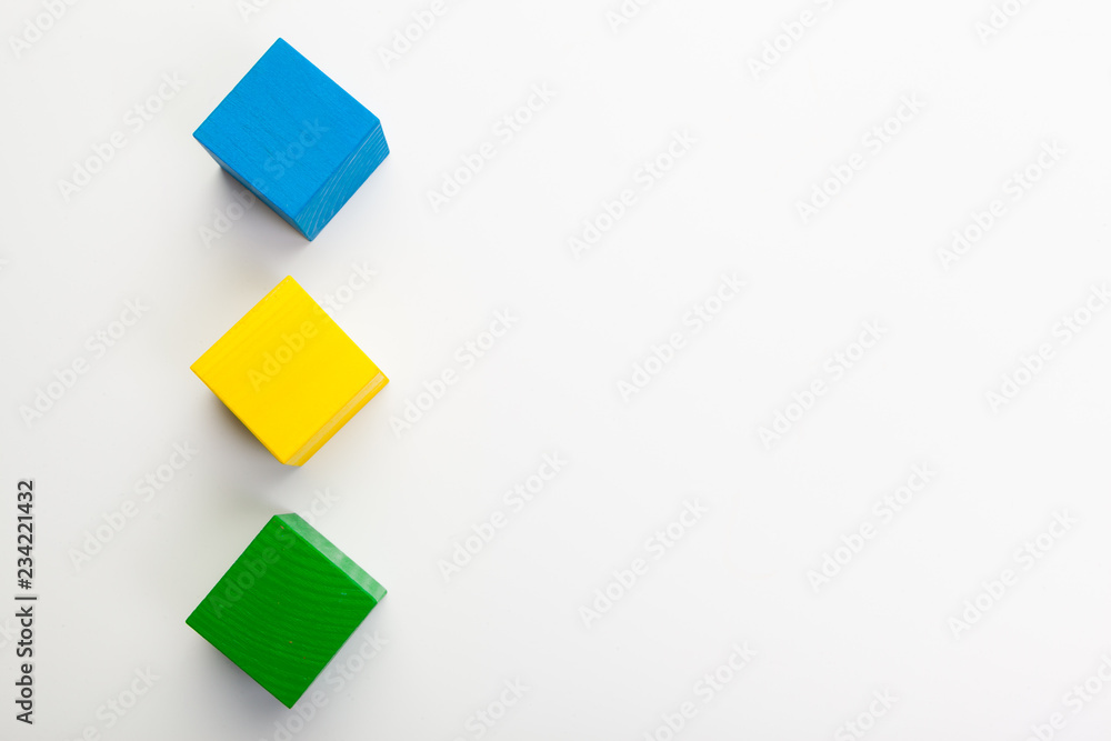 Colorful wooden building blocks isolated on white background Colorful wooden building blocks isolated on white background