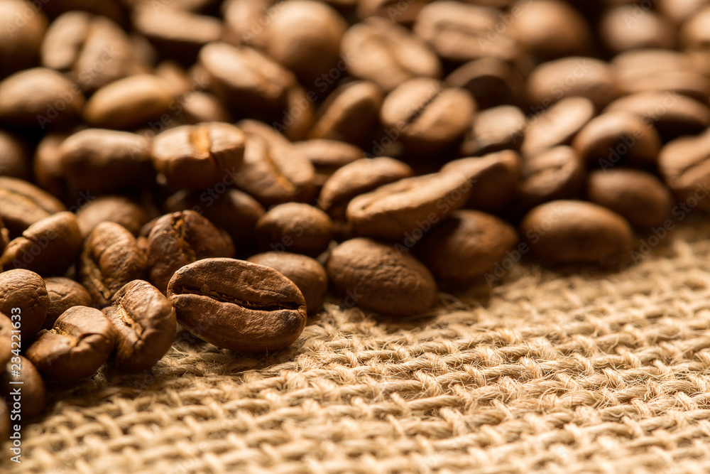 Fototapeta premium Coffee beans. Dark background with copy space, close-up
