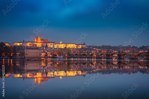 Beautiful twilight view over Charles Bridge and Prague Castle in Prague, Czech Republic, Europe © Evgeni