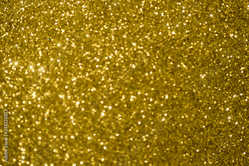 Blurred Background, golden Christmas texture. A cropped shot, close-up, nobody, horizontal, abstraction. Christmas holiday concept.