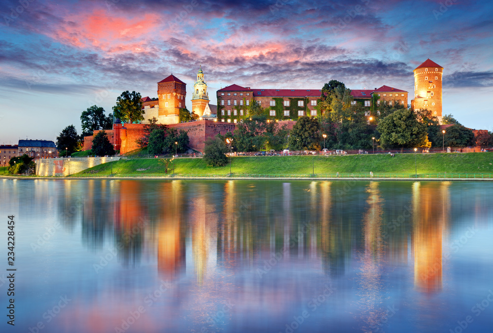 Wawel hill with castle in Krakow at night, Poland