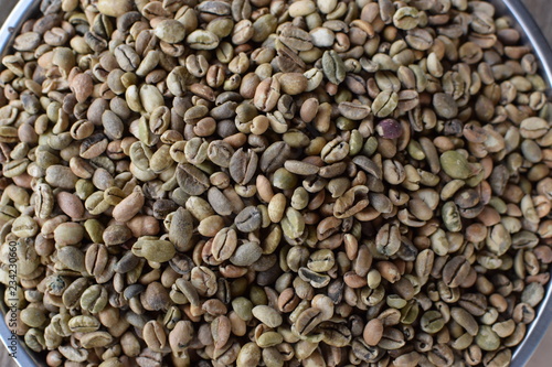 Raw Coffee beans close up backgrounds textures