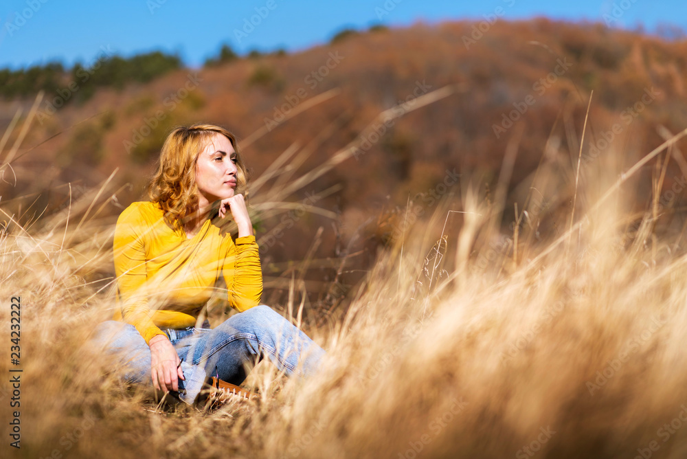 Fashionable girl outdoors enjoying a sunny day Fashionable girl outdoors enjoying a sunny day