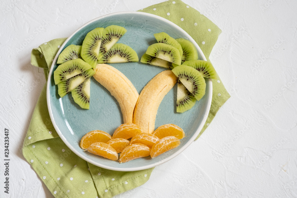 fruit salad for kids, kiwi banana mandarin palm trees
