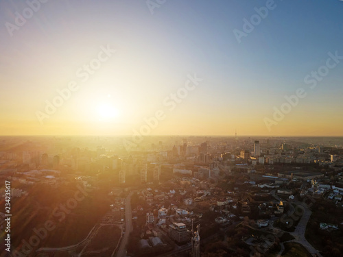 The panoramic bird s eye view from drone to the modern district of Kiev  Ukraine at summer sunset.