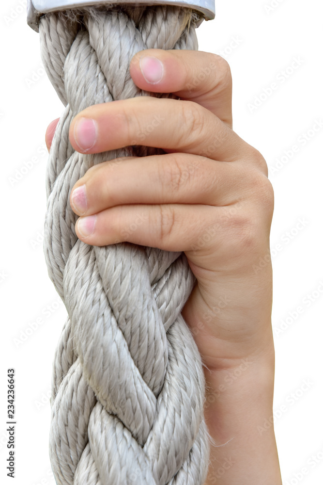 child's hand holds very thick nylon rope isolated on white Stock Photo