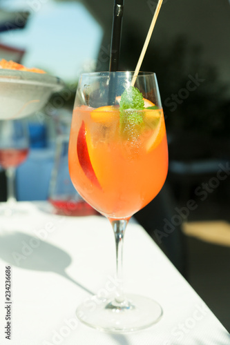 Peach mint cocktail, outdoors