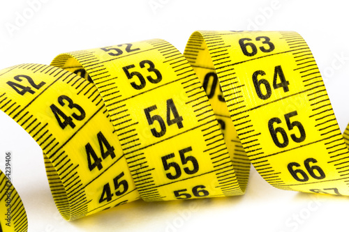 Measuring tape of the tailor for you design. On white background