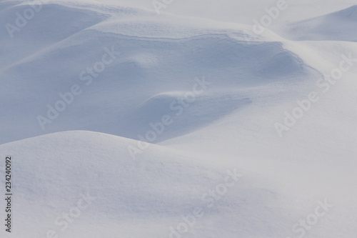 Snowdrift surface like a toy bear muzzle. Selective focus. Shallow depth of field © strannik_fox
