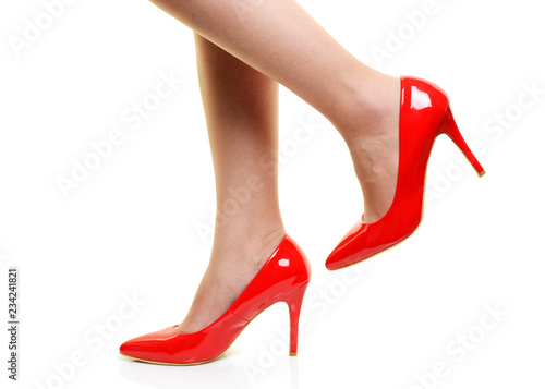 Woman wearing sexy red stiletto high heels, close up, cut out