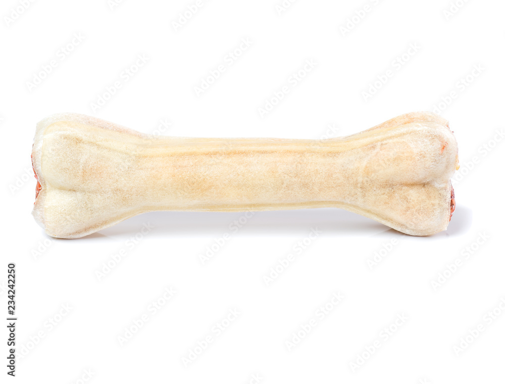 Artificial dog chew bone food with vitamins isolated on white background Artificial dog chew bone food with vitamins isolated on white background