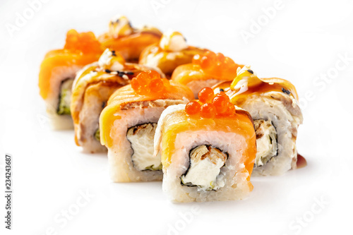 Closeip image of classic philadelphia sushi rolls with salmon, cream cheese, eel and red caviar isolated at white background.