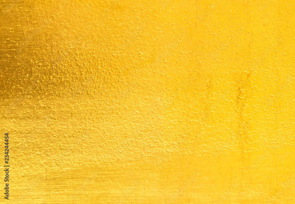 Fototapeta premium Shiny yellow leaf gold foil texture