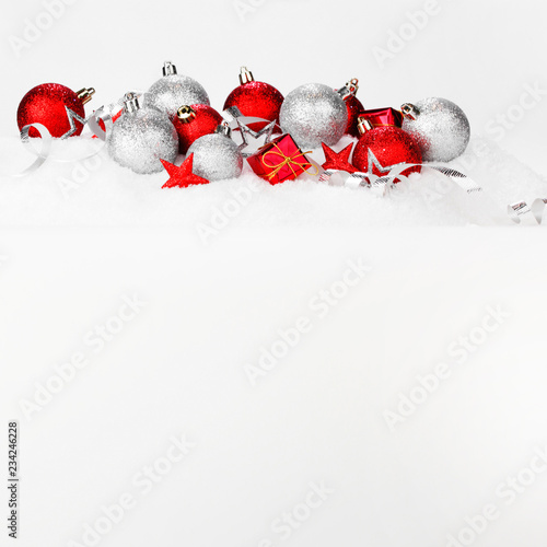 Christmas balls on snow