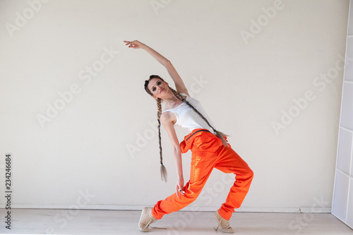 beautiful fashionable dancer dances to music portrait