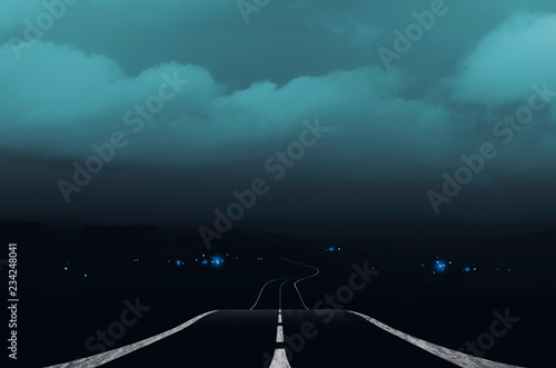dark landscape with road an...