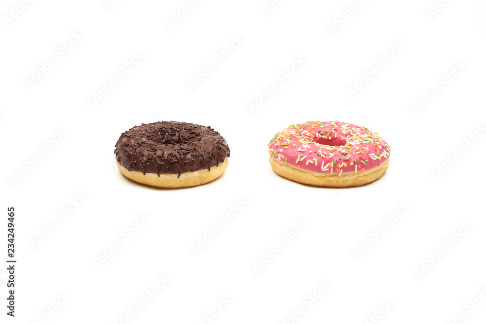 Tasty chocolate donut and Pink donut with colorful sprinkles on white background