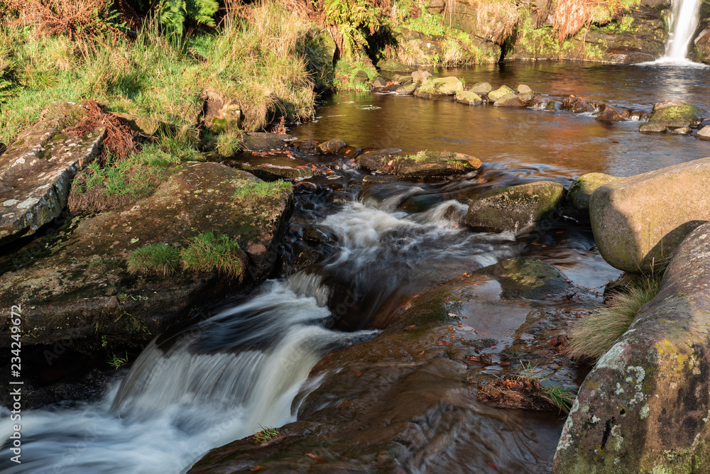 Fototapeta premium Cascading water at Three Shires Head.