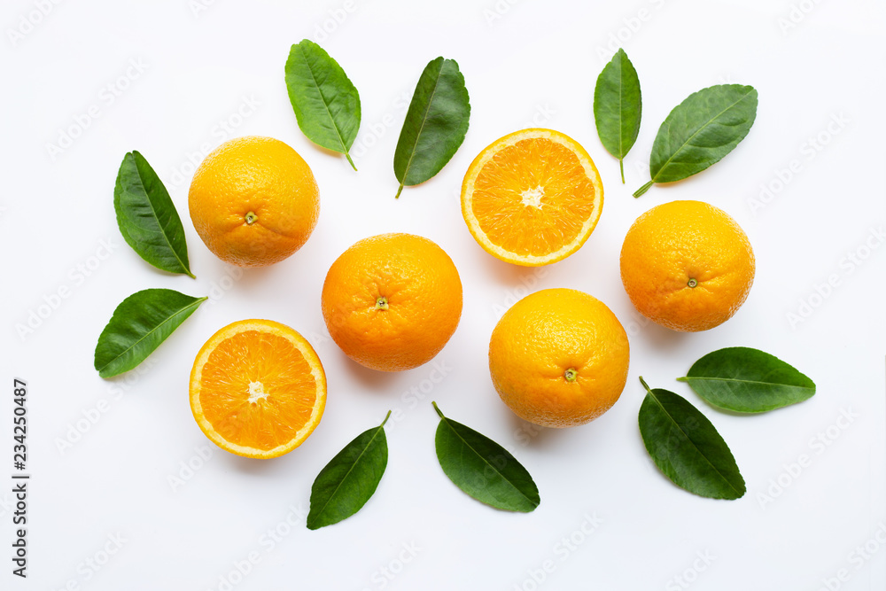 Fresh orange citrus fruit with leaves isolated on white wooden background. Top view Fresh orange citrus fruit with leaves isolated on white wooden background. Top view