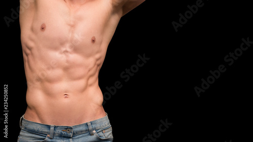 Image of hot and shirtless male body in jeans