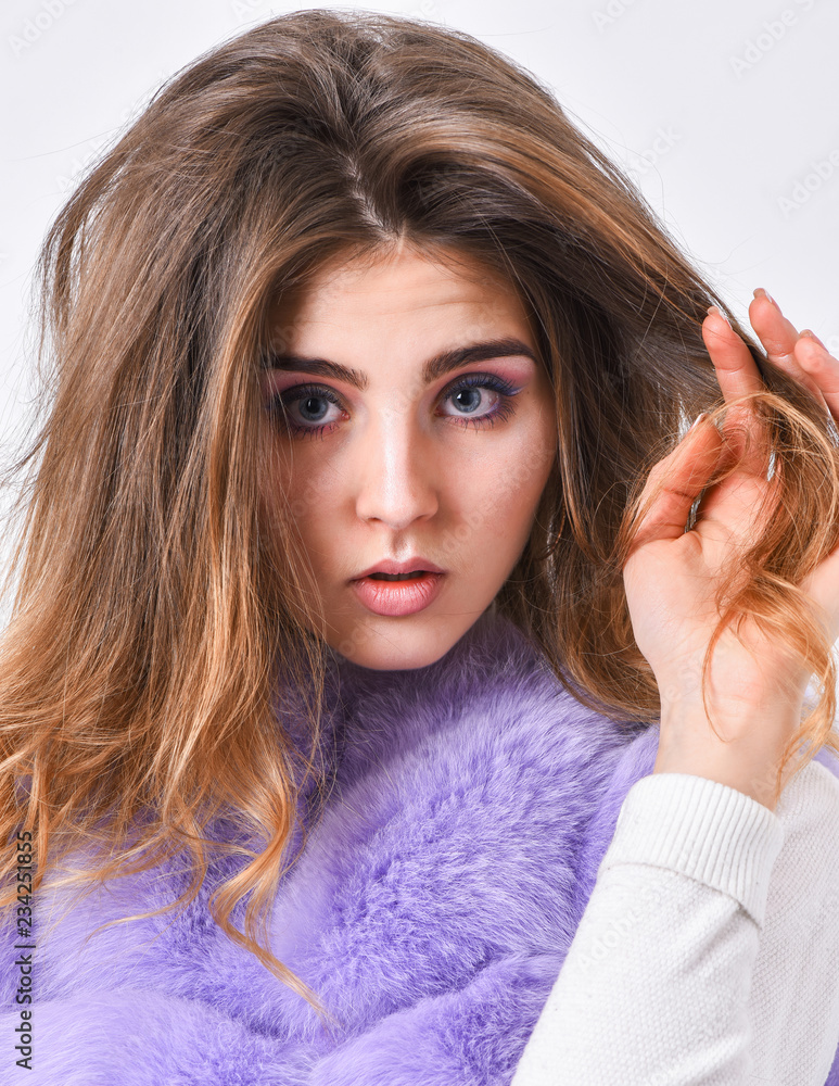 Winter hair care tips you should follow. Hair care concept. Girl fur coat  posing with hairstyle on white background. Prevent winter hair damage. Woman  makeup face touch hair volume hairstyle Stock Photo |