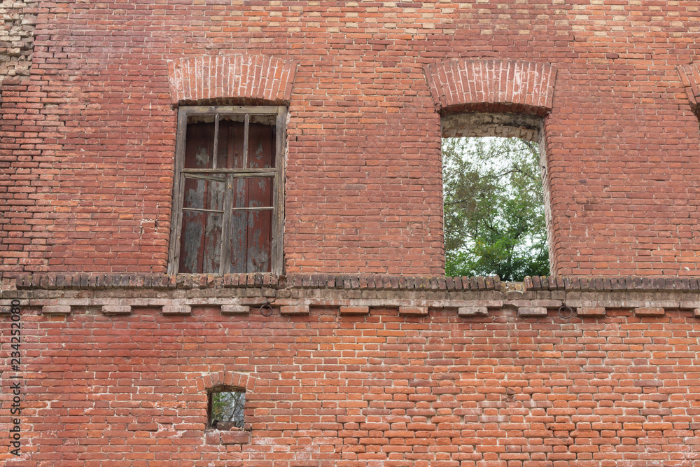 Fototapeta premium Windows in brick wall