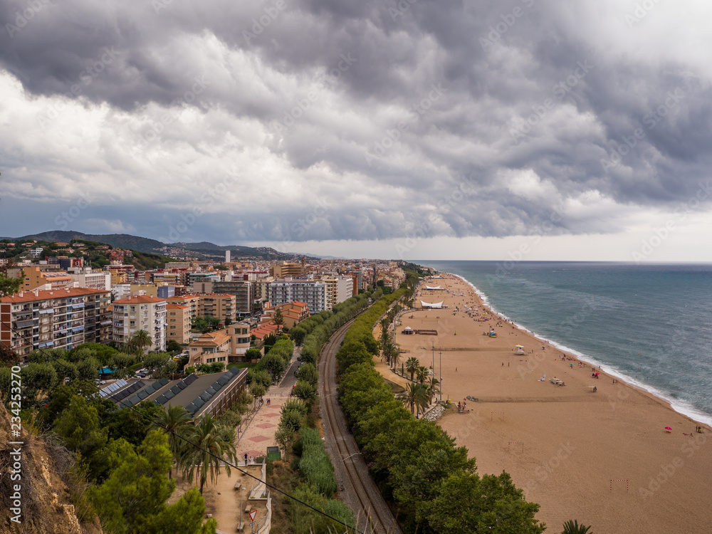 Panorama of the resort town of Calella before a thunderstorm.