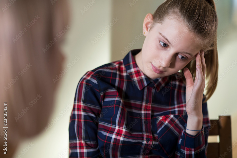 Depressed Teenage Girl Meeting With Counselor Depressed Teenage Girl Meeting With Counselor