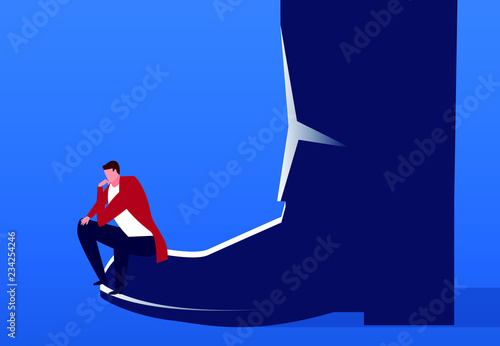 Businessman sitting on giant's shoes