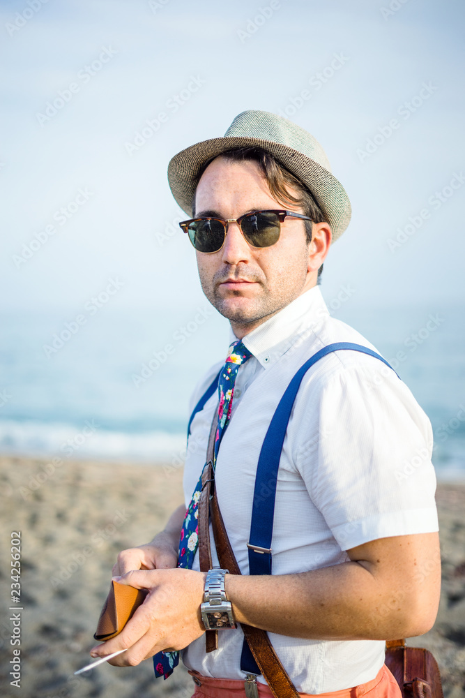 Portrait of  young man in retro style clothes