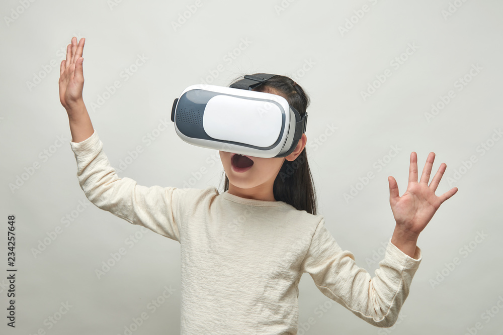 Smiling girl with glasses of virtual reality Smiling girl with glasses of virtual reality
