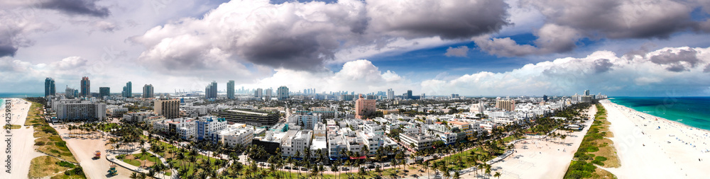 South Beach in Miami at sunset. Panoramic aerial view of city and coastline