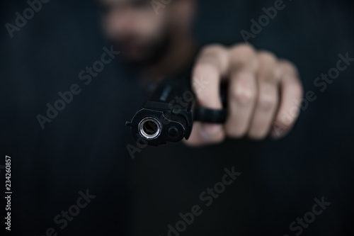 Man hand shooter photo