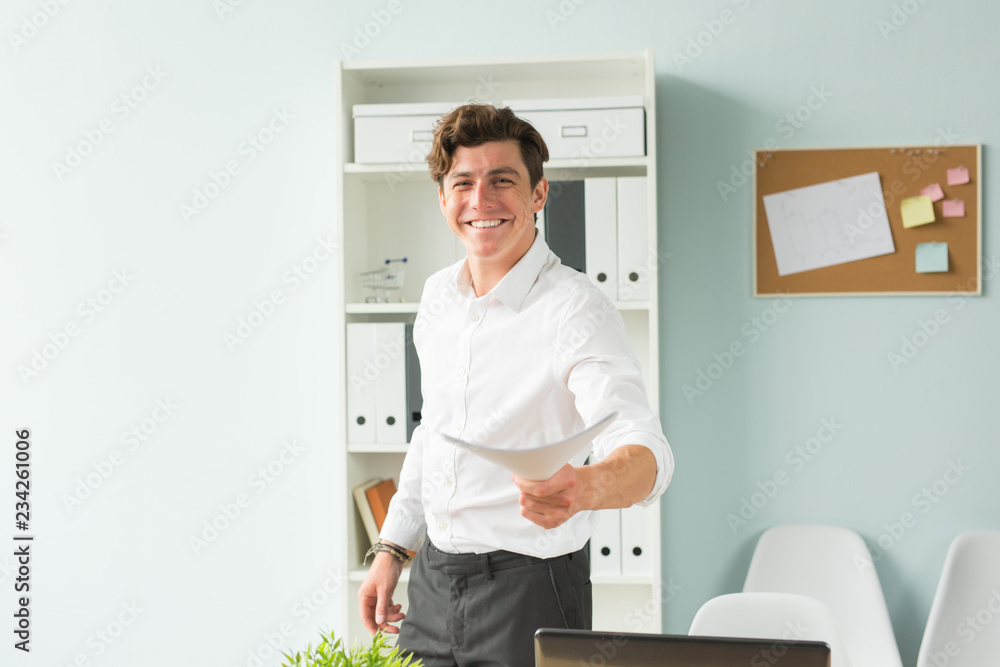 Business people, fool and joke concept - young handsome man in the office