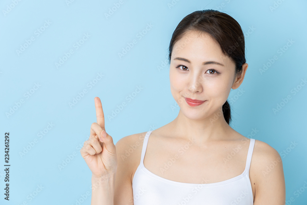 attractive asian woman beauty image on blue background