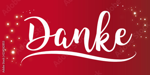 Das Wort DANKE auf rotem Hintergrund mit Sternen