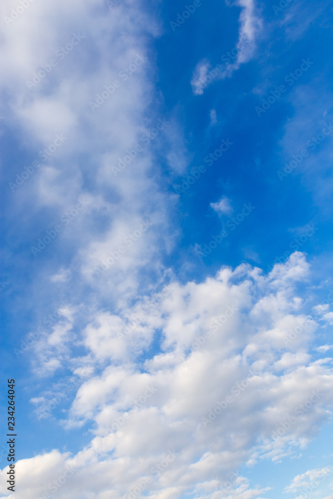 Clouds against blue sky as abstract background