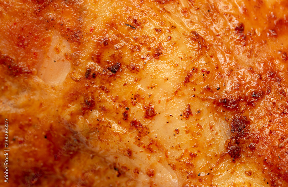 Grilled fresh chicken crust as abstract background Grilled fresh chicken crust as abstract background