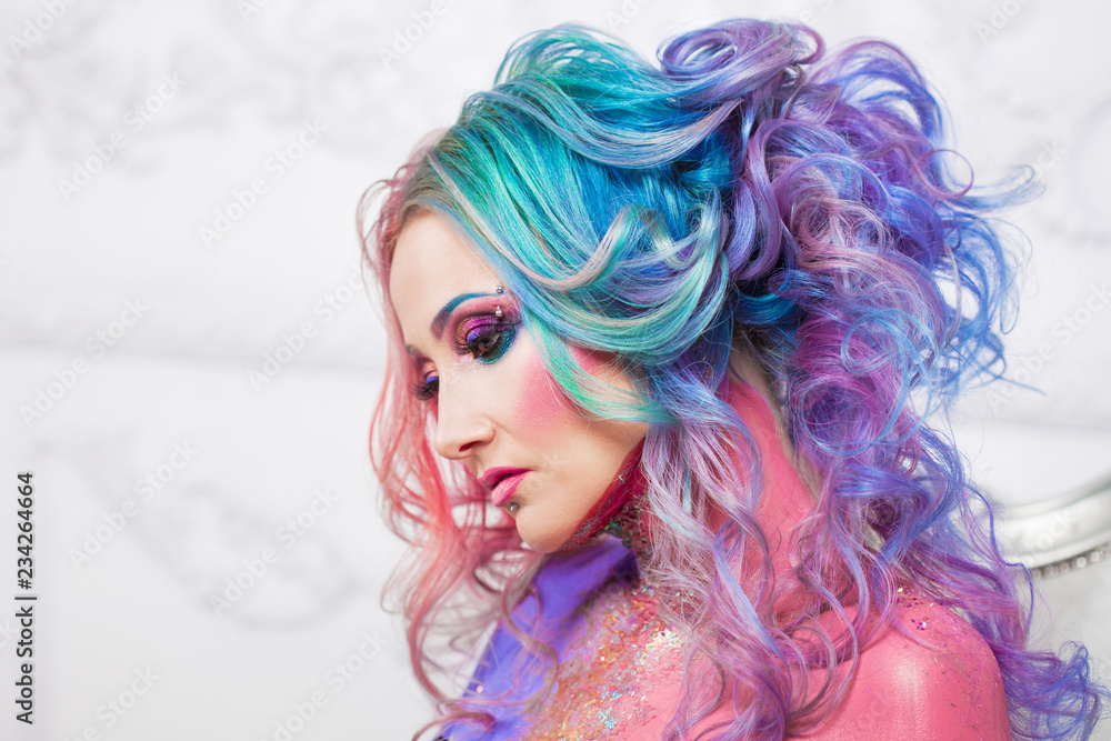 Beautiful woman with bright hair. Bright hair color Stock Photo | Adobe  Stock