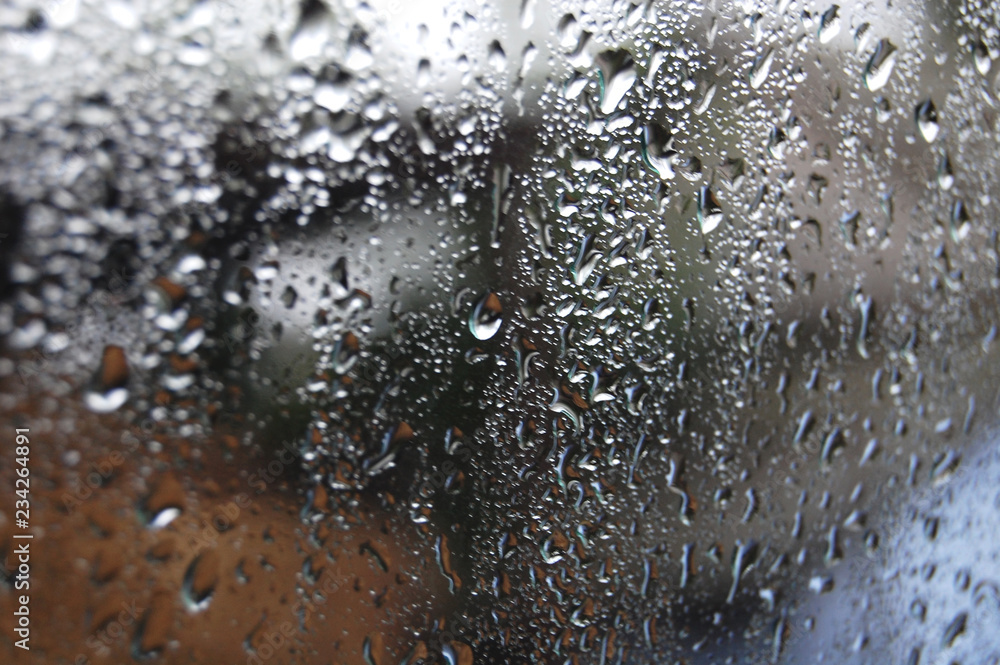 Raindrops on car glass surface. Background or wallpaper. Raindrops on car glass surface. Background or wallpaper.