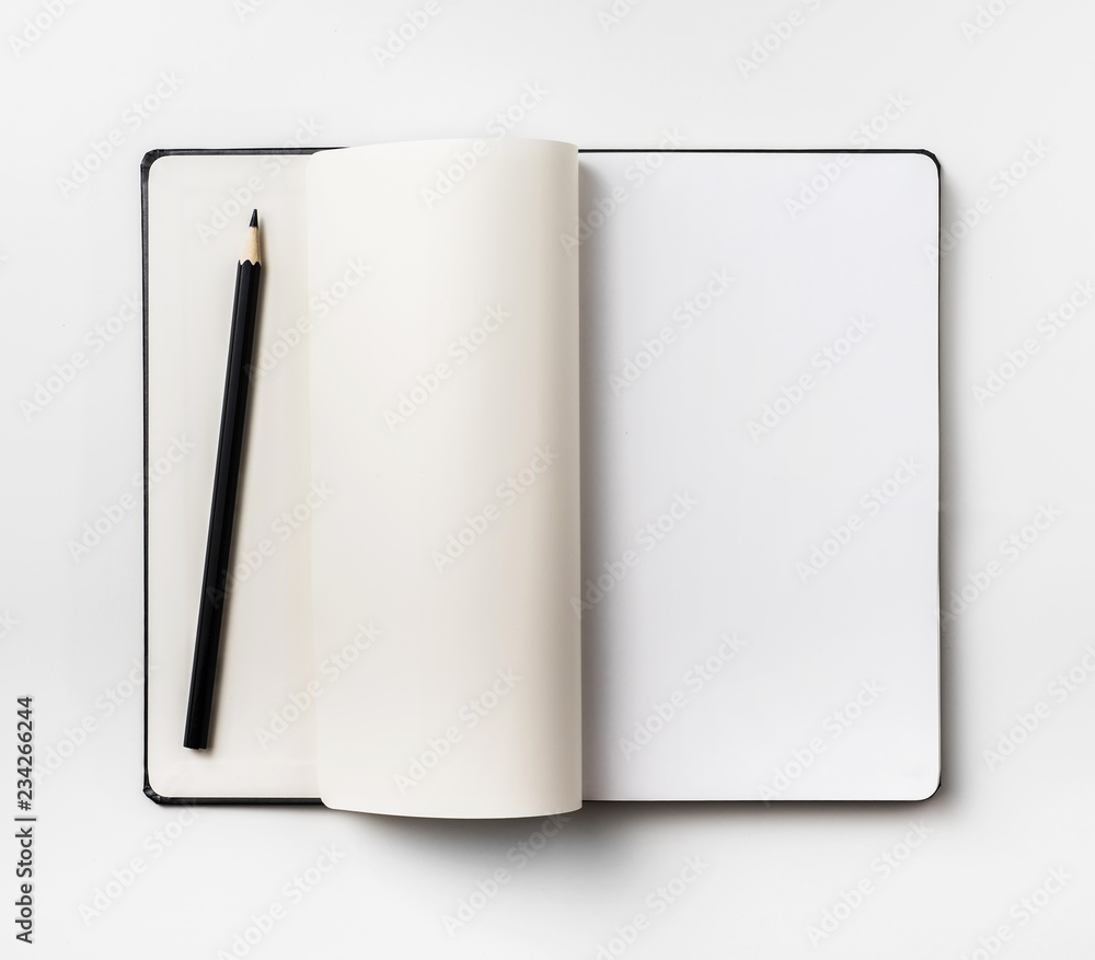 Top view of black notebook isolated on background Top view of black notebook isolated on background