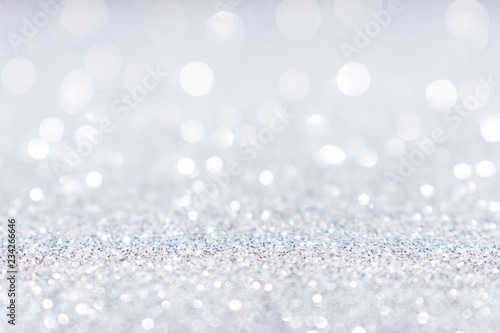 Abstract white silver glitter sparkle background.