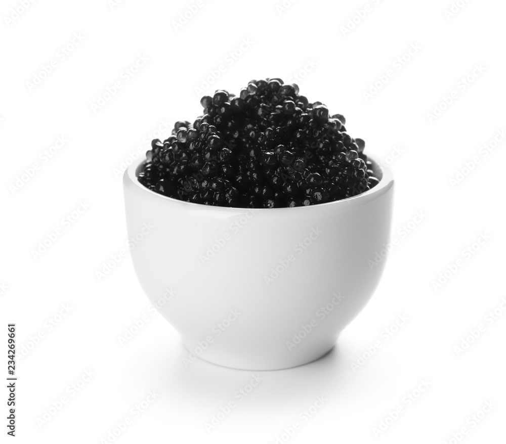 Bowl with delicious black caviar on white background Bowl with delicious black caviar on white background