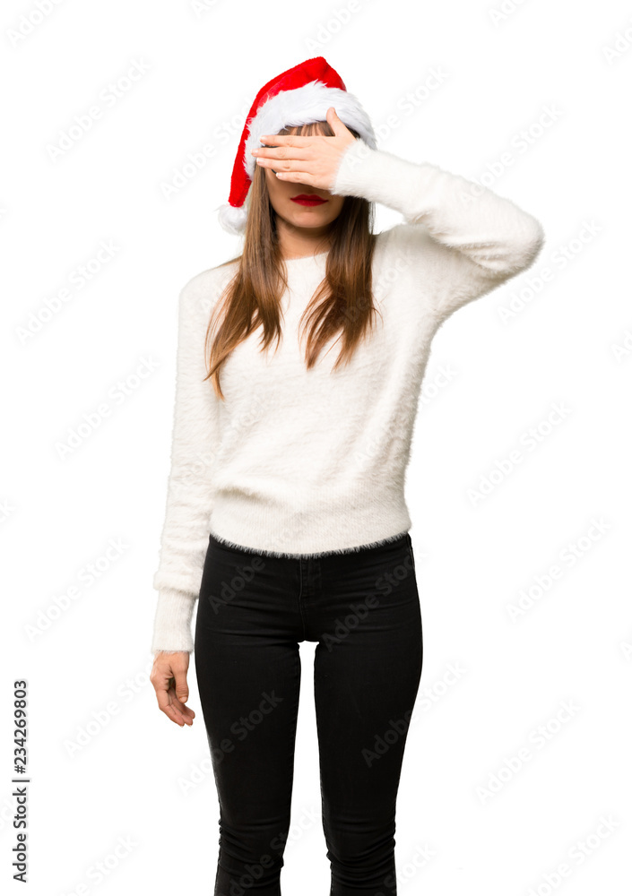 Girl with celebrating the christmas holidays covering eyes by hands. Do not want to see something on isolated white background Girl with celebrating the christmas holidays covering eyes by hands. Do not want to see something on isolated white background
