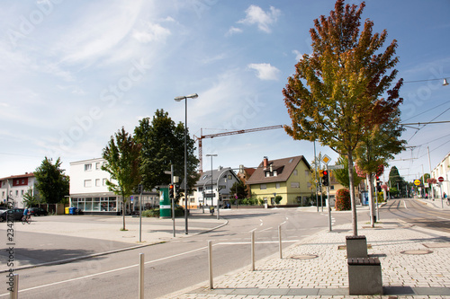 Classic building vintage style with landscape and traffic Sandhausen road at Heidelberg-Kirchheim district in Heidelberg, Germany photo