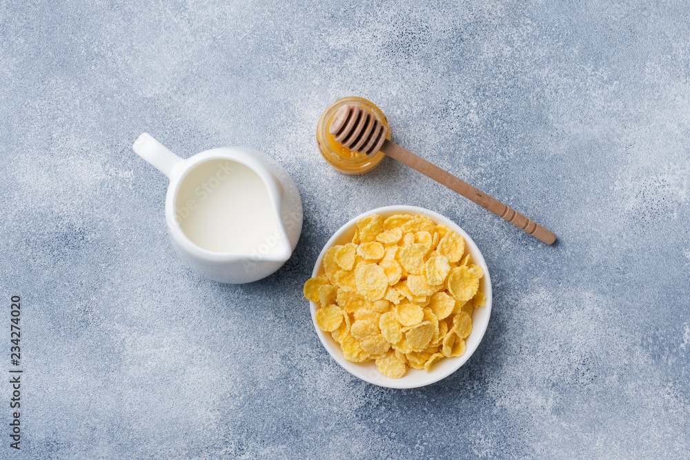 Fototapeta premium Healthy Breakfast of cereals, milk, honey and fruit. Balanced diet.