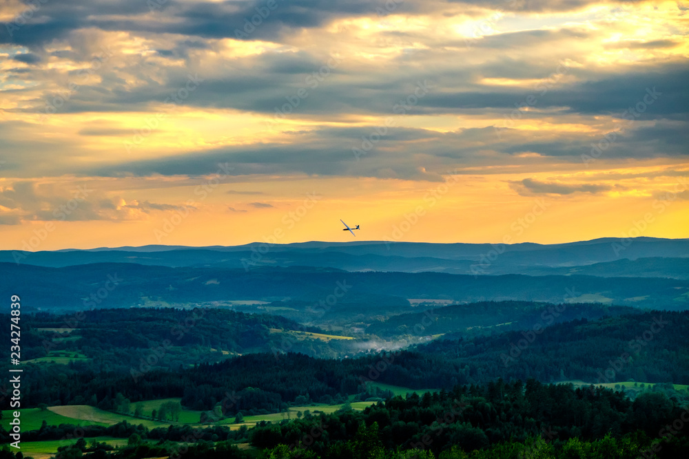 Glider flying over mountains in Bezmiechowa Gorna, Poland. 29-07-2016
