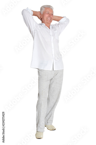 Portrait of senior man posing on white background © aletia2011